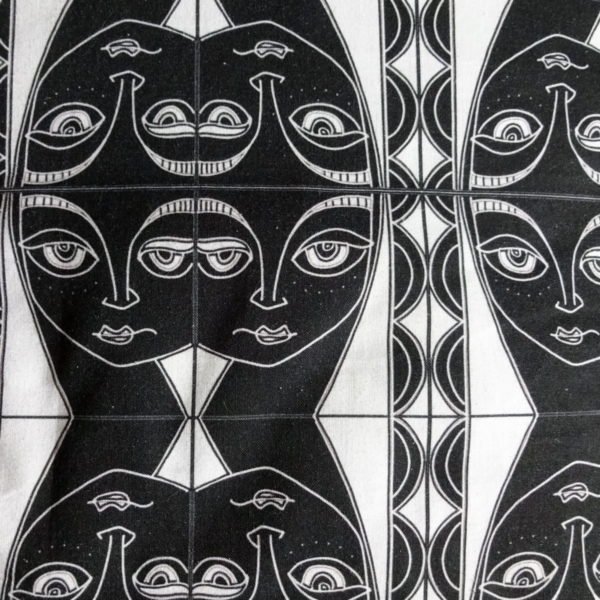 wicked imp designs limited edition cotton fabric "by the sea" black and white head of a woman mirror repeat