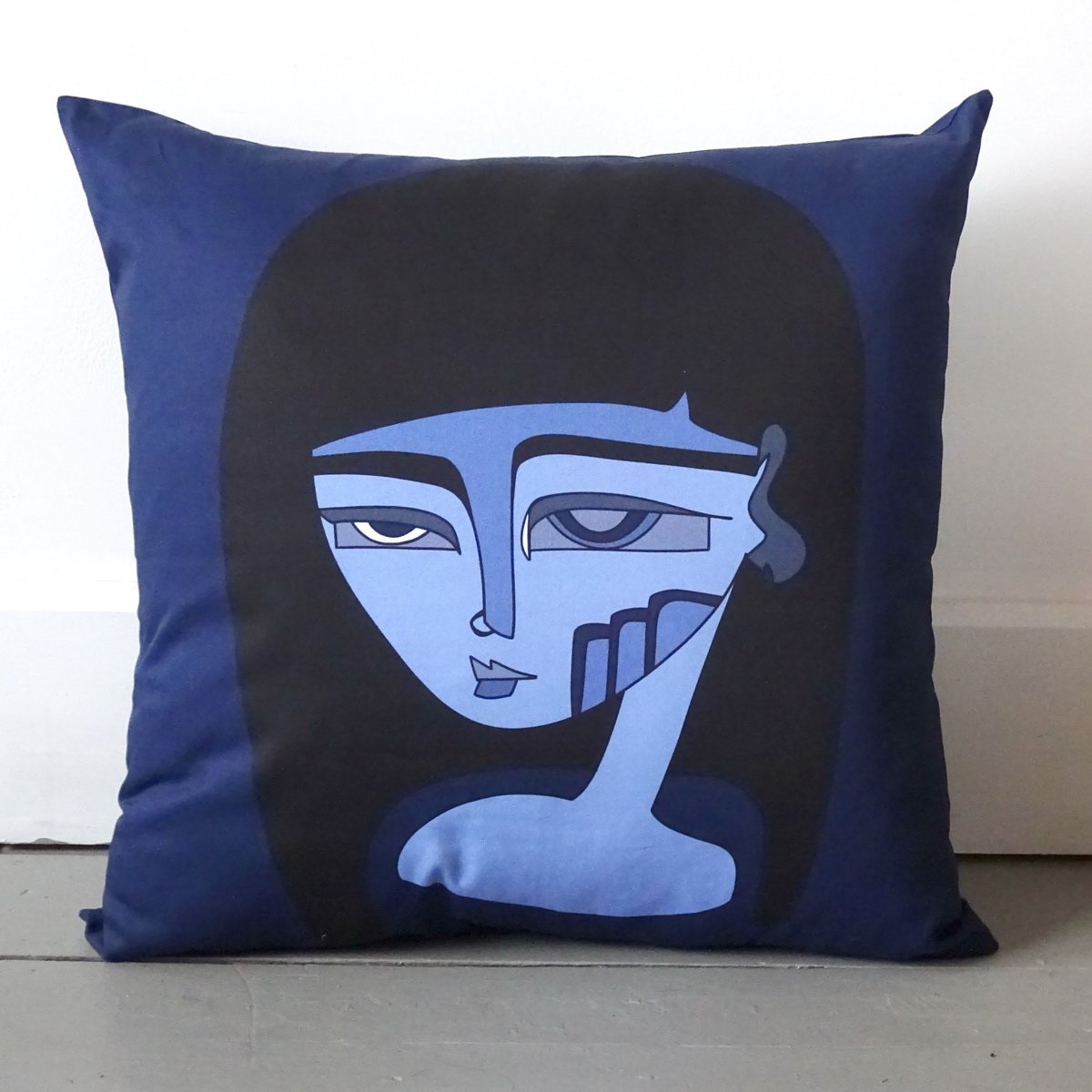 extra large cushion madam X large face in blues with black hair. 100% cotton light twill wicked imp designs